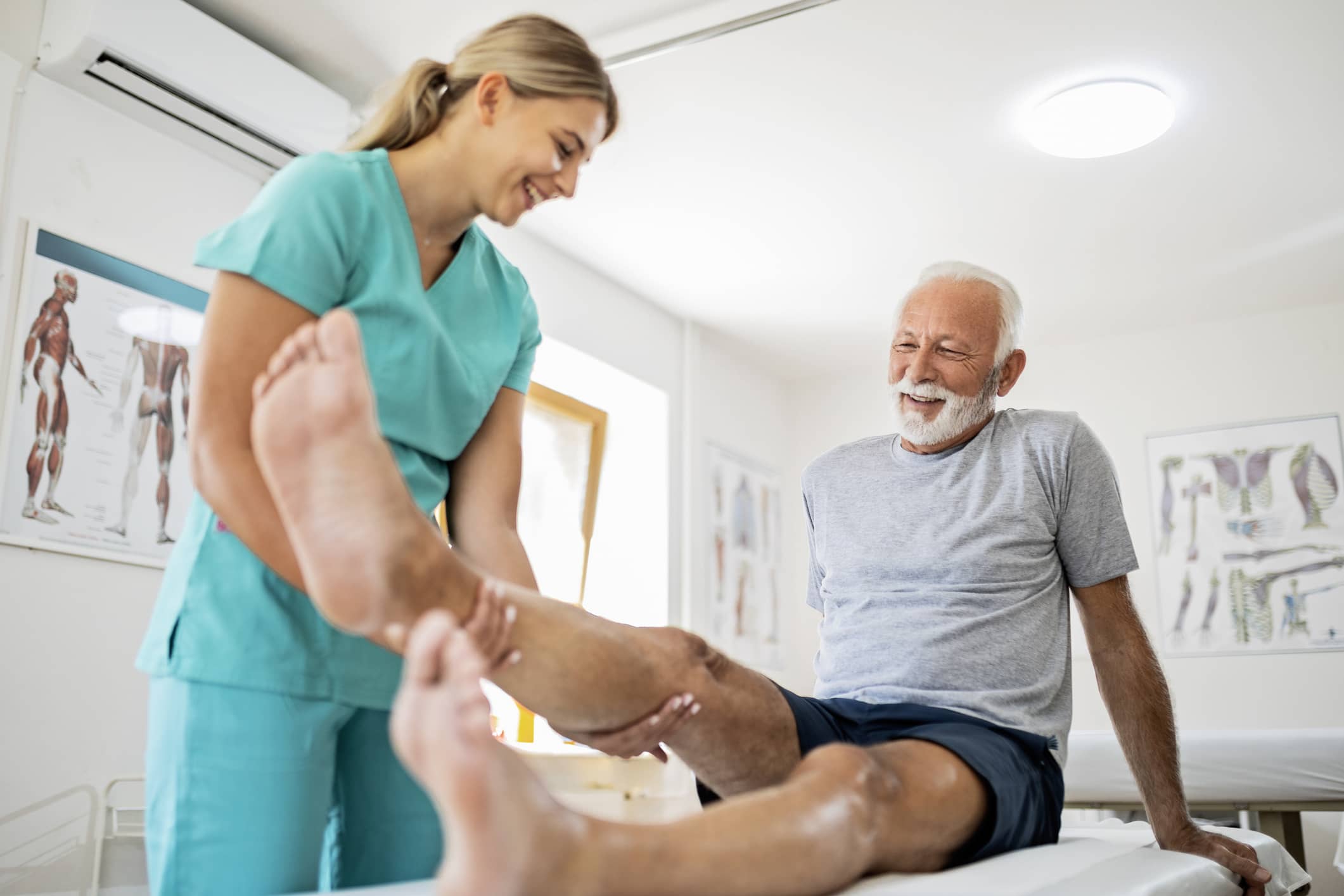 Physical Therapist Working With Knee Replacement Patient