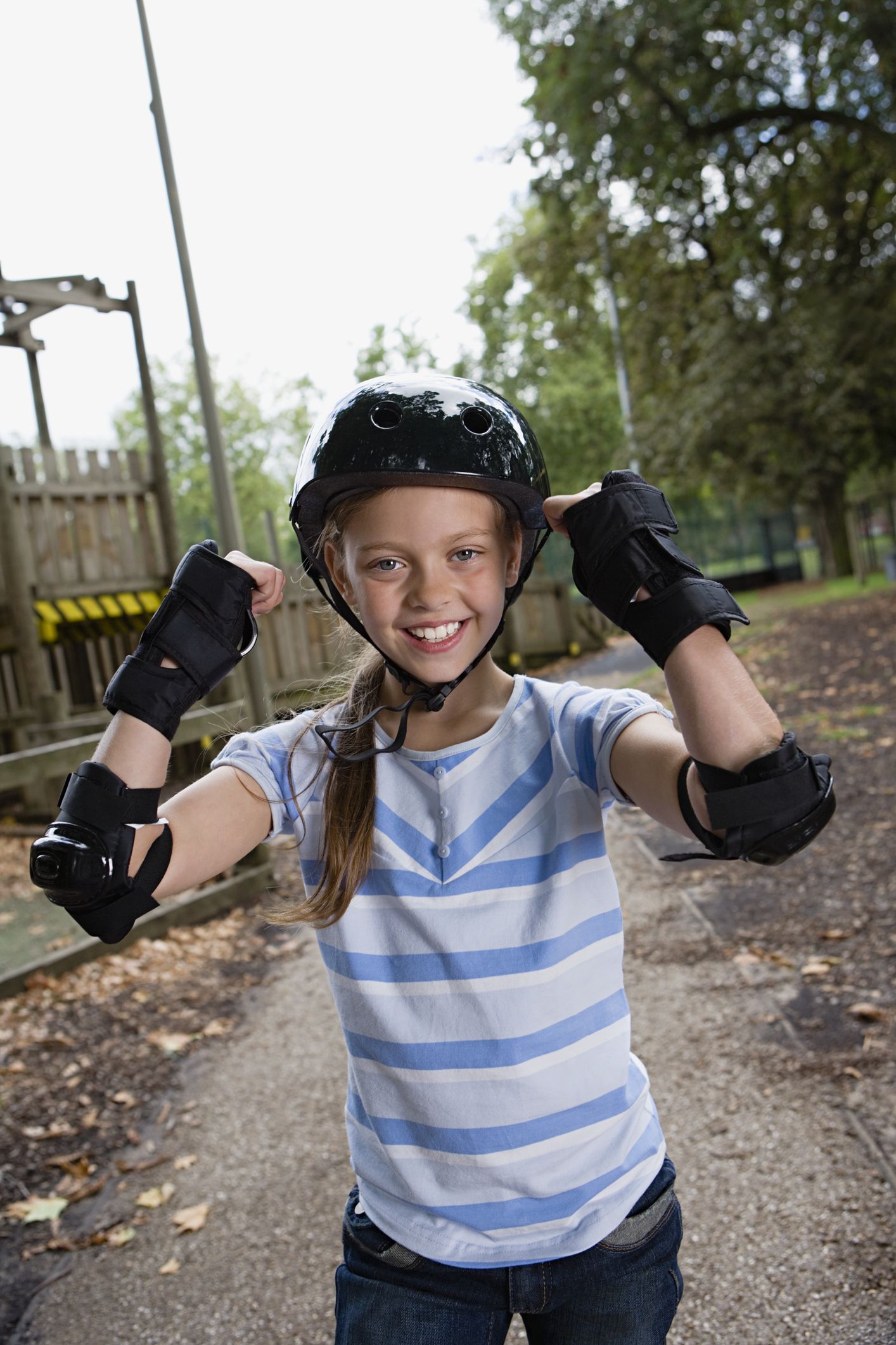 Skateboarder with protective gear
